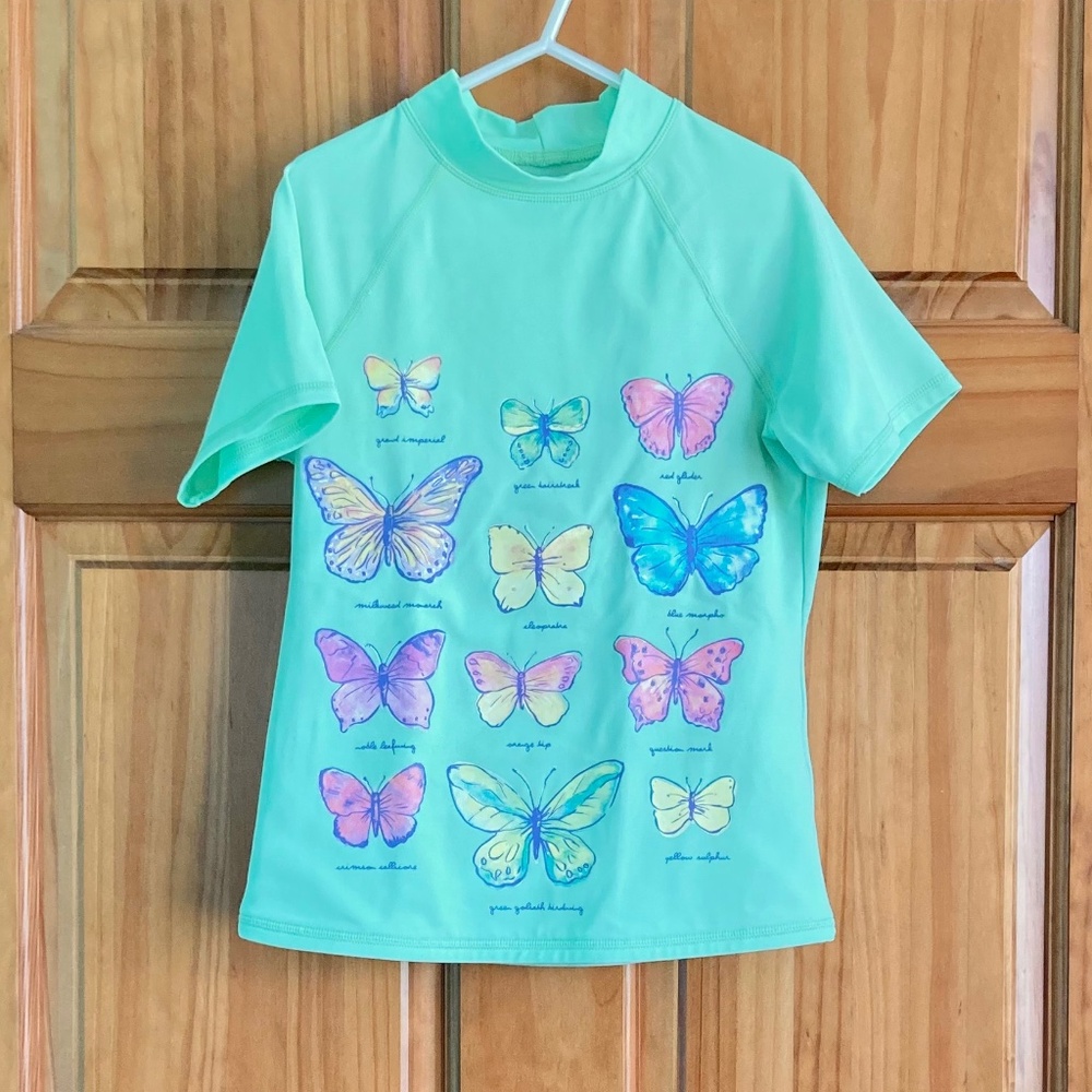 Girl’s size 7-8 Lands’ End short sleeved green butterflies swim top, swim shirt